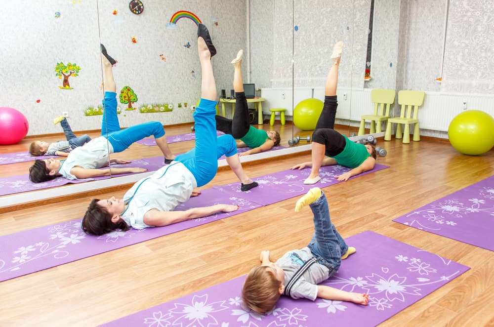 kids stretching on yoga mats