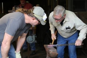 Instructor shows hammering techniques