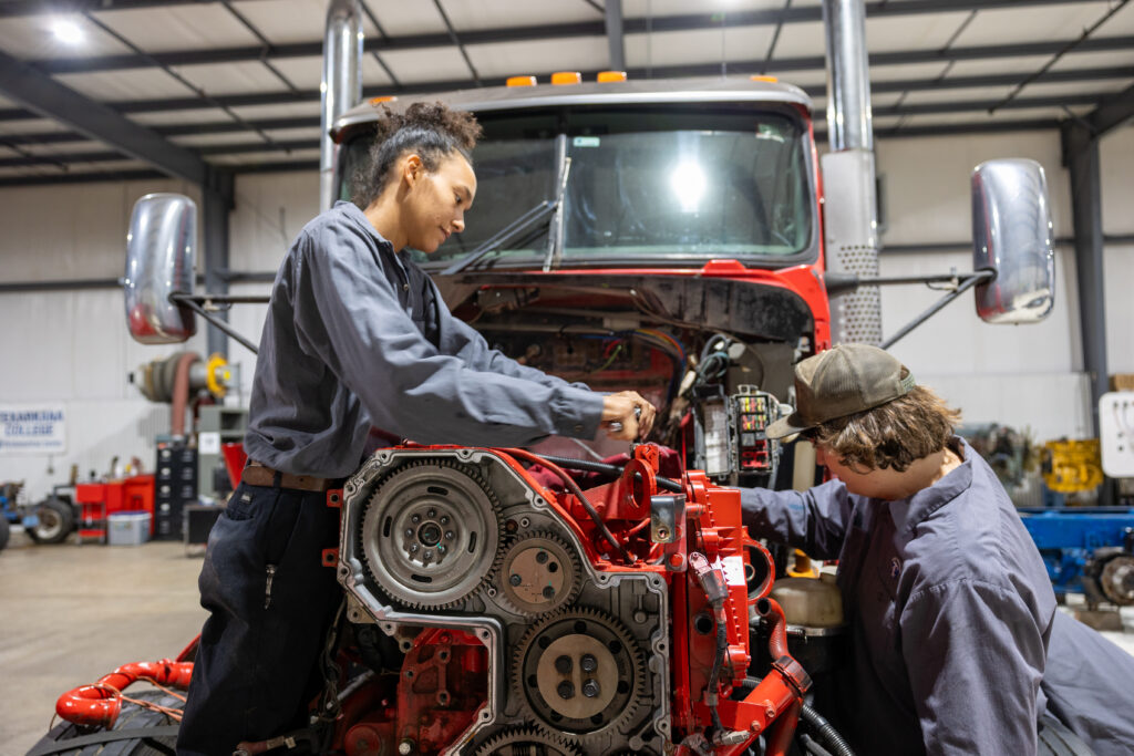 Diesel Technology students at work on engine maintenance during a classroom lab