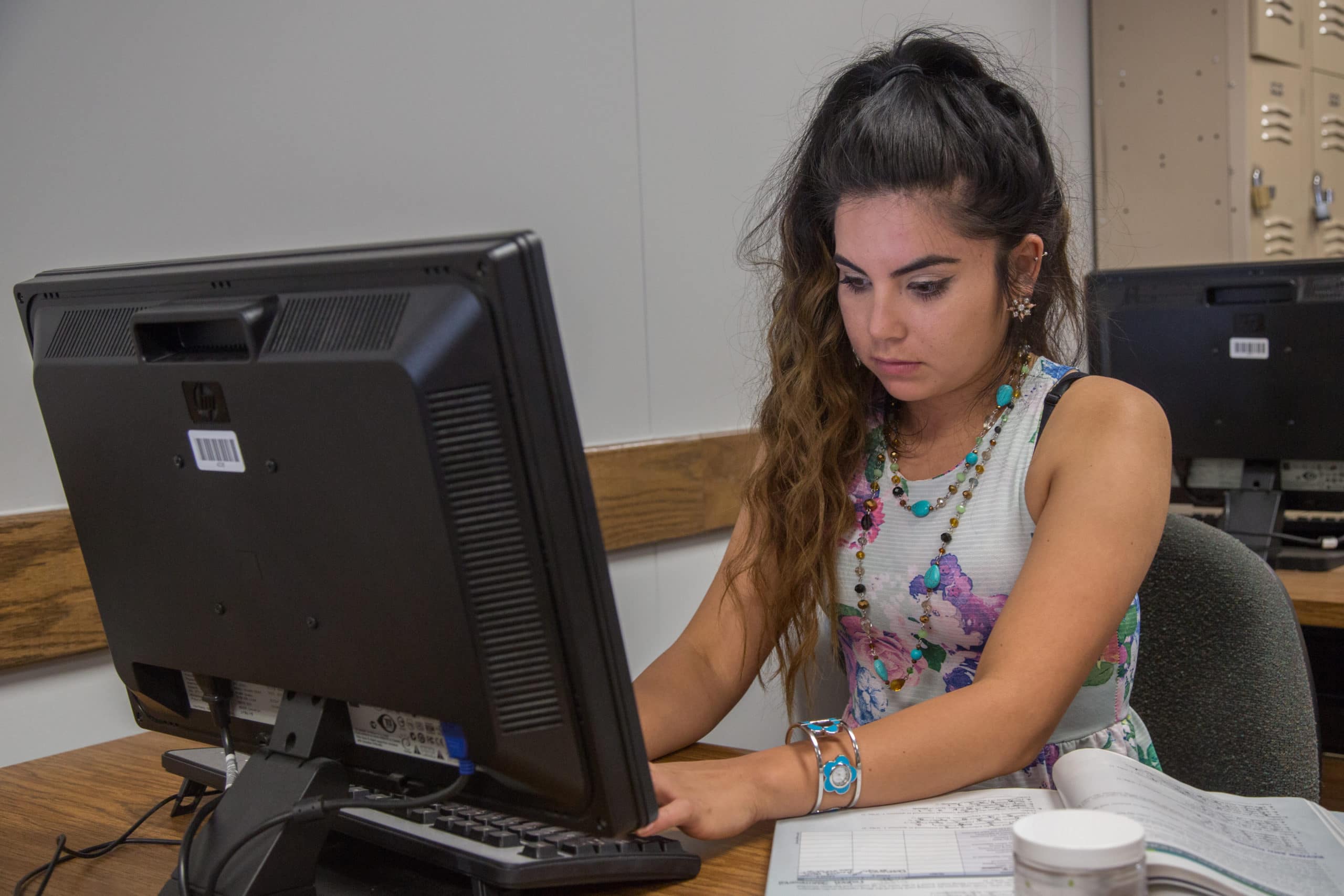 Business Office Technology student working in lab