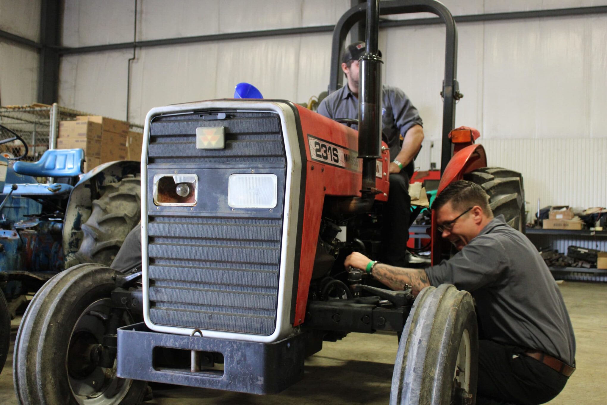 Students working on a diesel engine