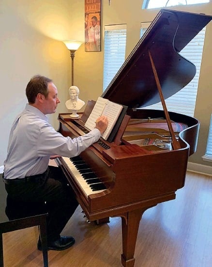 Marc-Andre Bougie composing at the piano