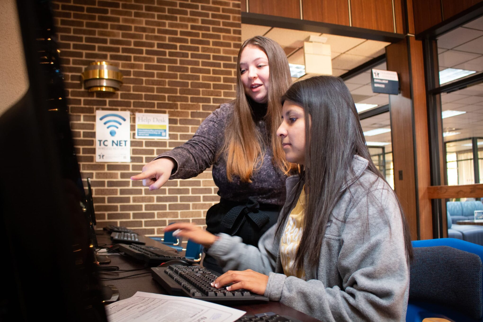 Future students of Texarkana College complete their community college application