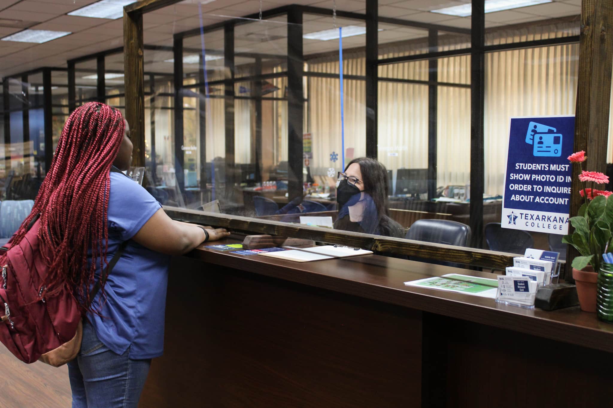 Student at Enrollment Services front desk