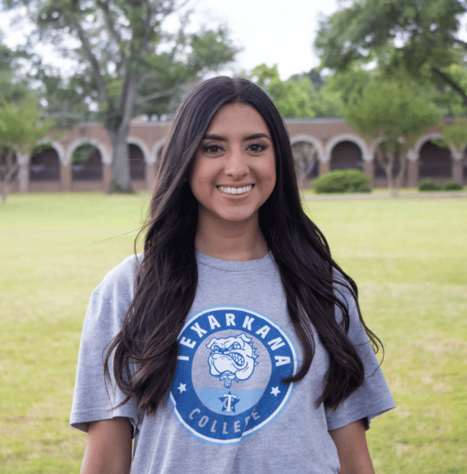 Business Administration Student, Catalina Cordero, stands in front of the Business & Computer Technology Building on the Texarkana College Campus.