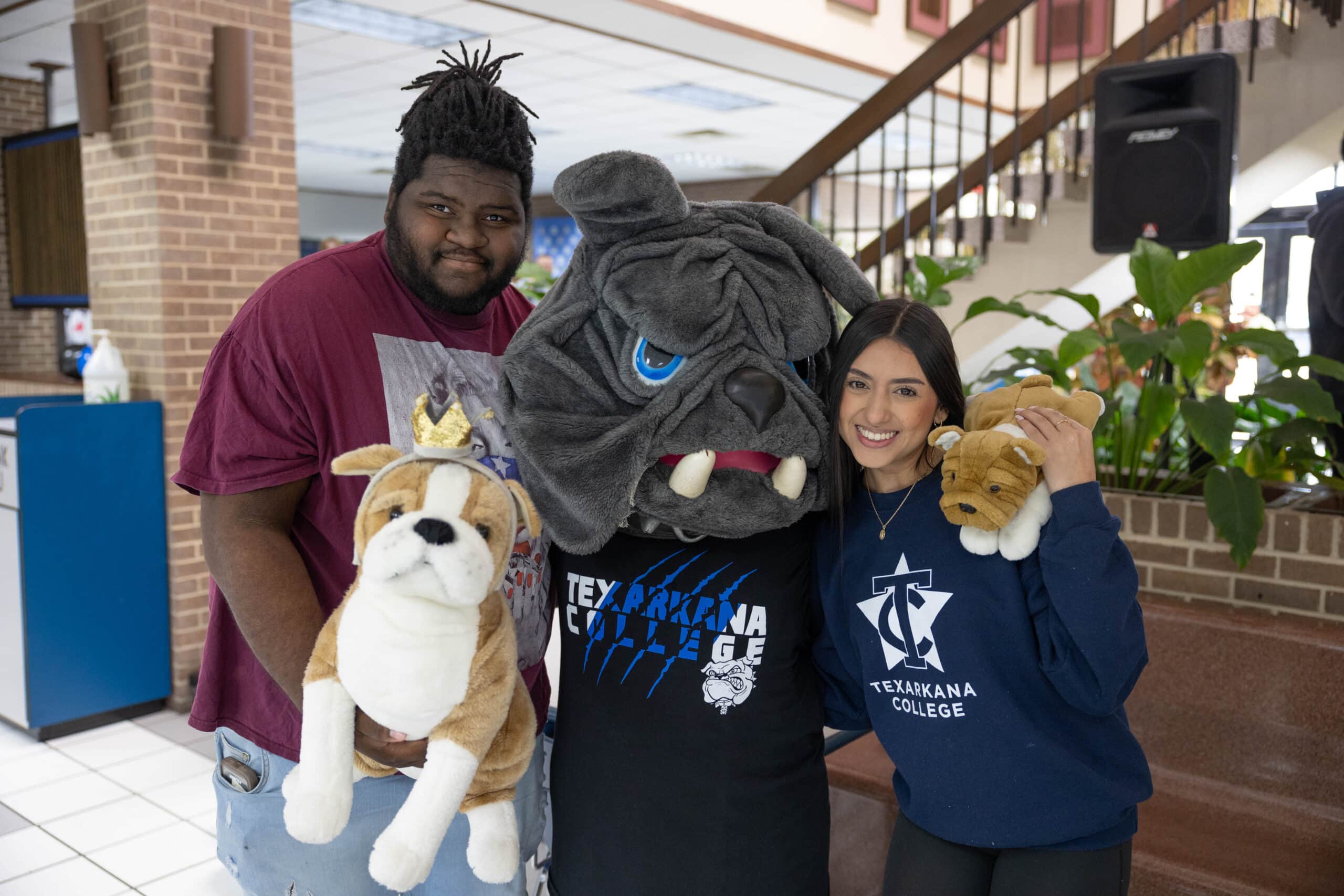 Students posing with Bo the Bulldog