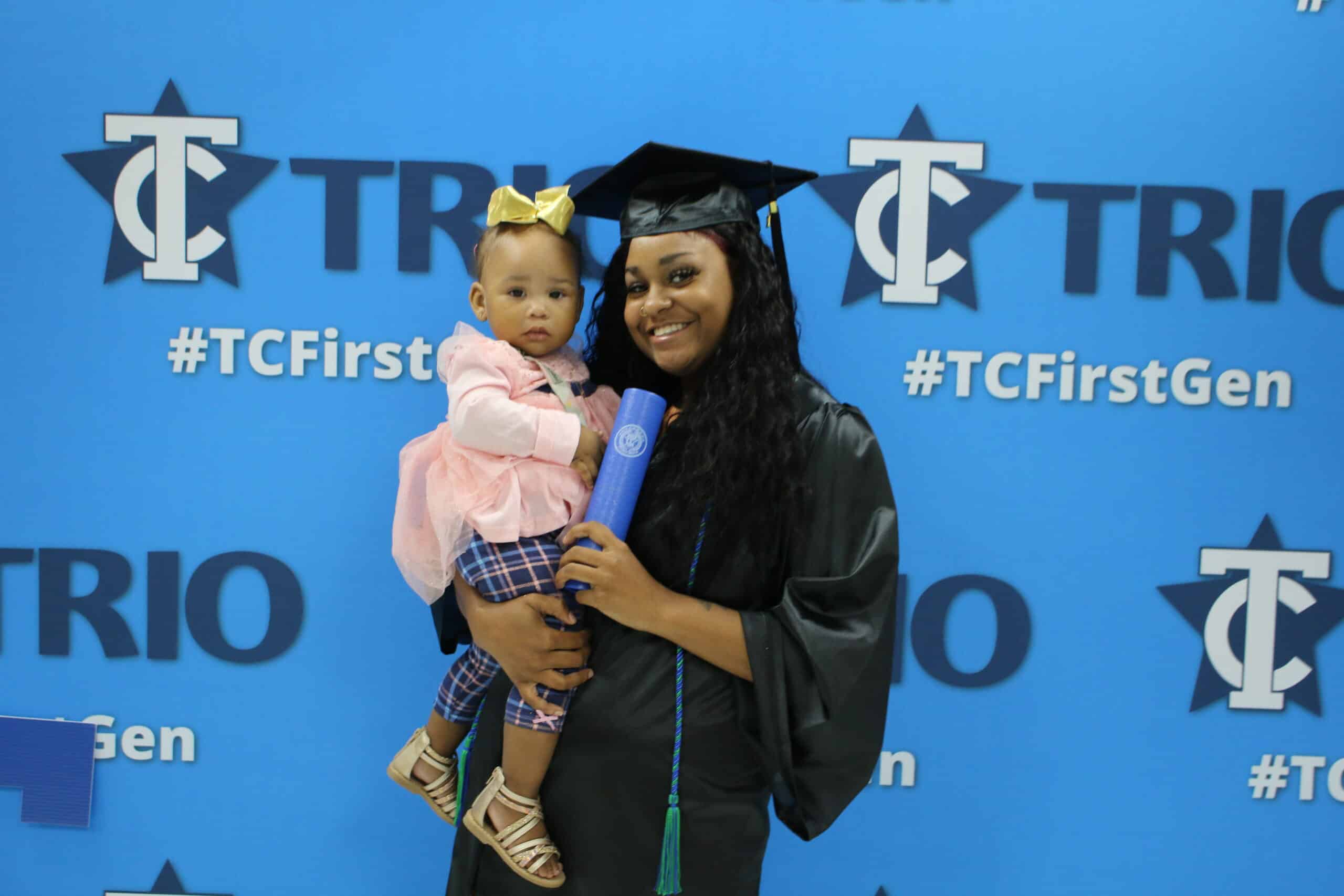 Graduate with child