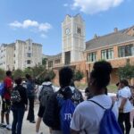 Students touring a college campus