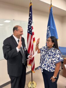 Dr. Jason Smith swearing in Liliana Luna as a Texarkana College Trustee.