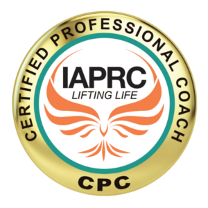A gold circular badge displaying CERTIFIED PROFESSIONAL COACH and CPC around the edges, with IAPRC LIFTING LIFE and an orange phoenix logo in the center.