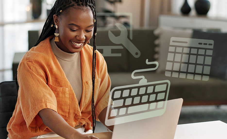 Smiling woman in an orange shirt uses a laptop at a desk in a bright room, with transparent graphics of a keyboard, wrench, and calendar overlaid on the image.